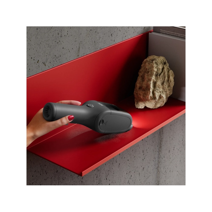 Product vacuuming fine dust on a shelf